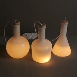 Nykyaikainen ja sovitettu Creative Magic White Glass Bottle Line -pisaravalo