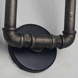 Retro metalliseinävalaisin kahvilaan